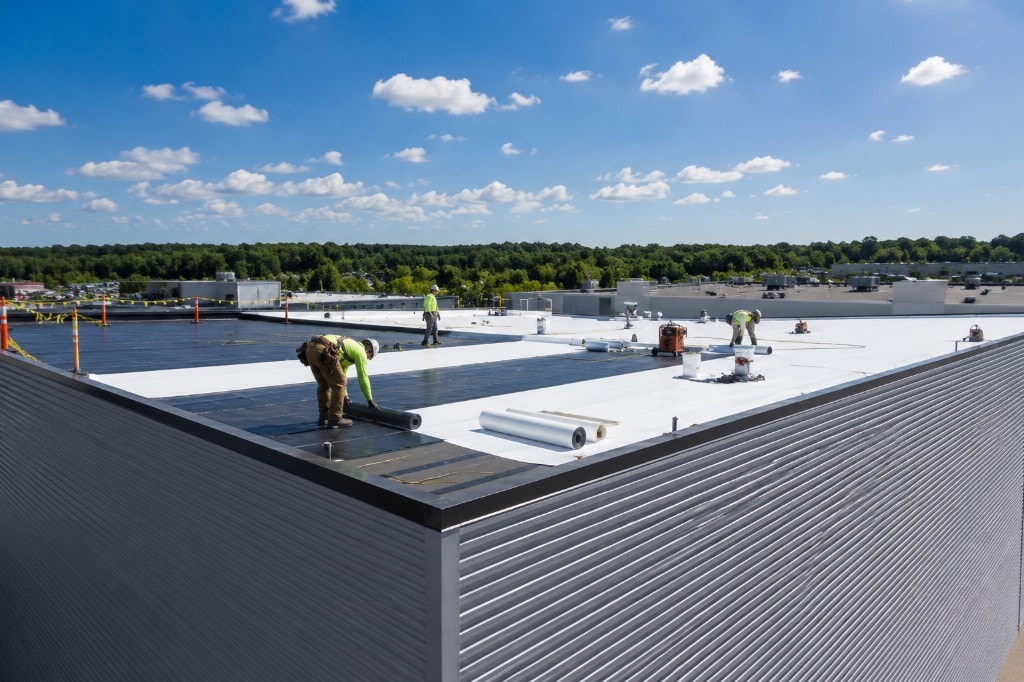 Commercial TPO flat roof installation by RC Carpentry & Roofing crew on a Fairfield County building